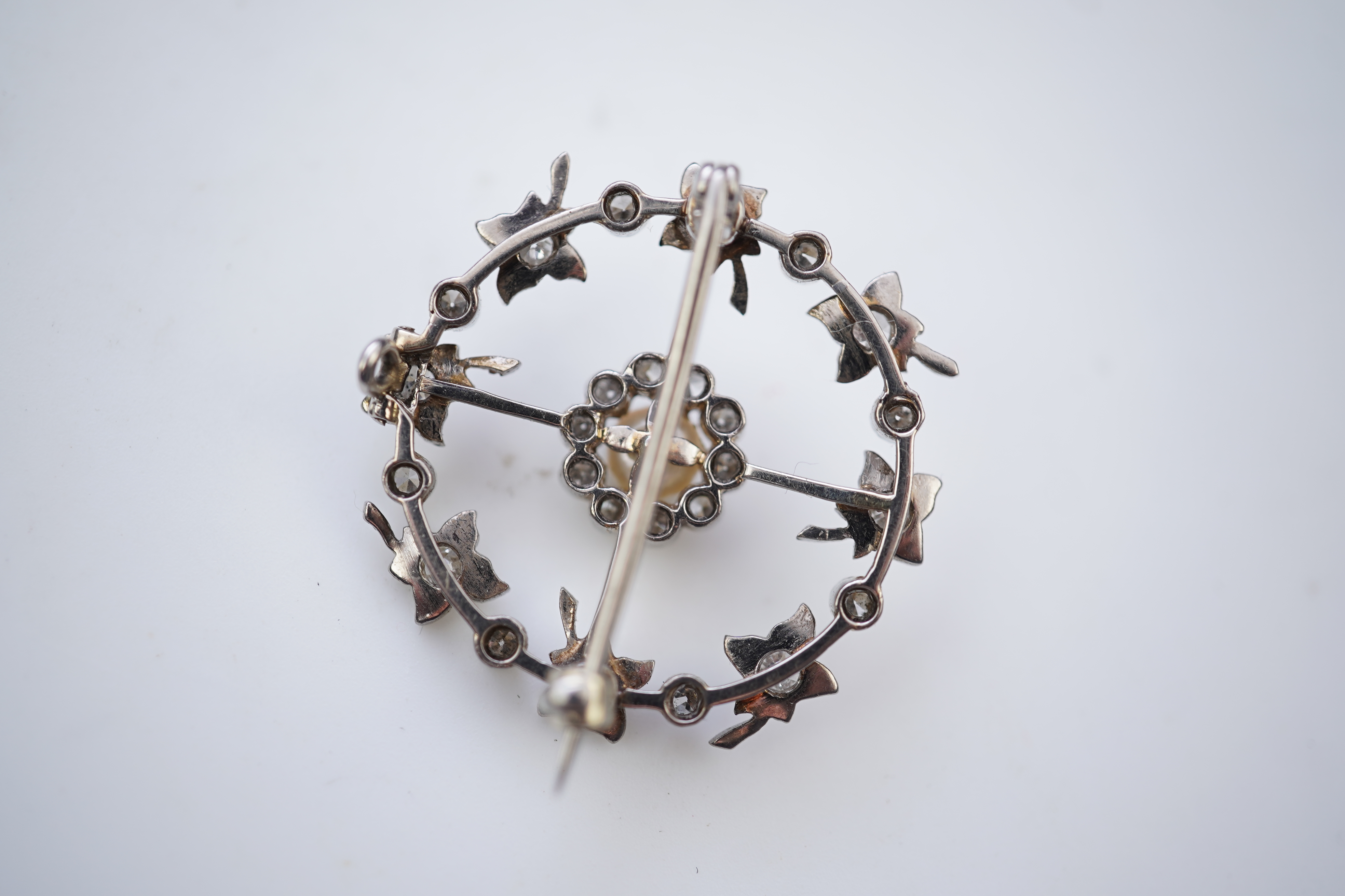 An attractive Edwardian pearl and diamond brooch, circa 1910